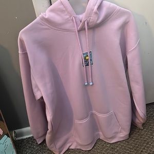 pastel purple hoodie with design on fromt